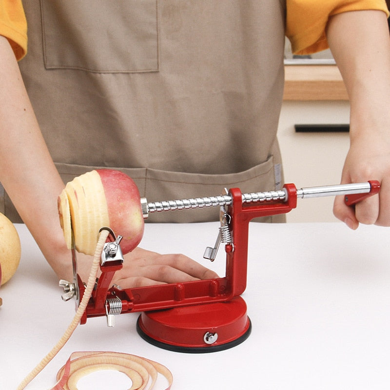 https://www.kitchenswags.com/cdn/shop/products/3-in-1-Apple-Peeler-Hand-cranked-Stainless-Fruit-Peeler-Slicing-Machine-Apple-Fruit-Machine-Peeled_8ab868b0-1fee-4729-91ae-ab50af4889cc.jpg?v=1667819288
