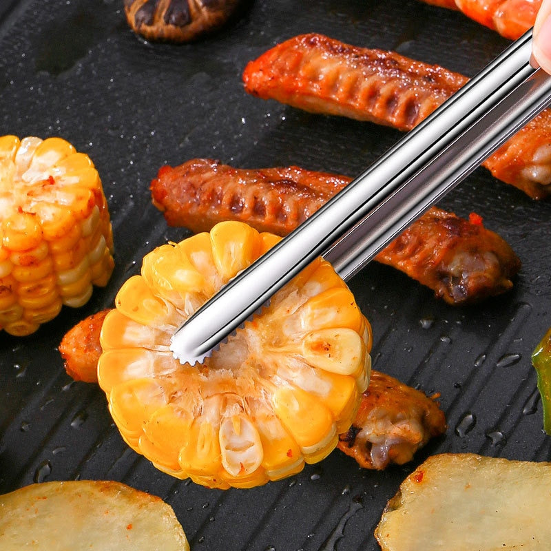 https://www.kitchenswags.com/cdn/shop/products/Grill-Tongs-Meat-Cooking-Utensils-For-BBQ-Baking-Silver-Kitchen-Accessories-Camping-Supplies-Free-Shipping-Item_05260f8f-9e15-4c5a-837d-ddd74ee13951.jpg?v=1667821349