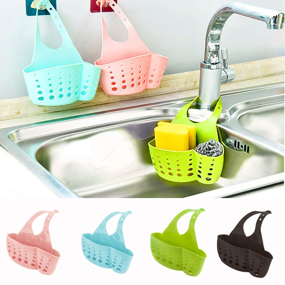 https://www.kitchenswags.com/cdn/shop/products/Kitchen-Organizer-Soap-Sponge-Drain-Rack-Sink-Shelf-Dish-Drainer-Portable-Hanging-Drain-Basket-Kitchen-Gadget.jpg?v=1667824550