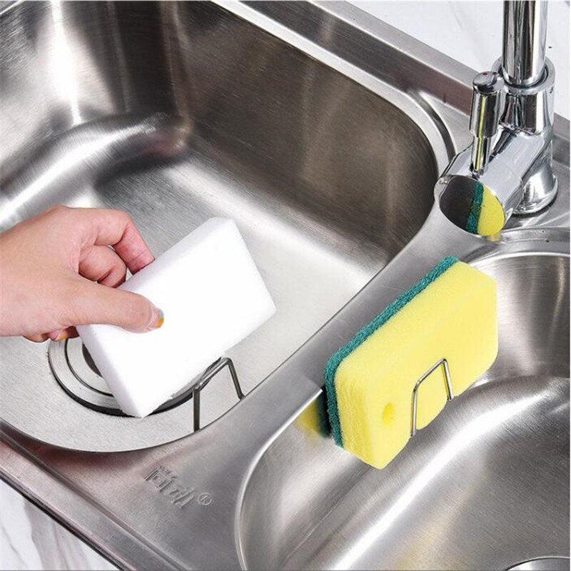 https://www.kitchenswags.com/cdn/shop/products/Kitchen-Stainless-Steel-Sink-Sponges-Holder-Self-Adhesive-Drain-Drying-Rack-Kitchen-Wall-Hooks-Accessories-Storage_cf61377e-8fc9-4301-a6a8-3d872fbc4d68.jpg?v=1667978712