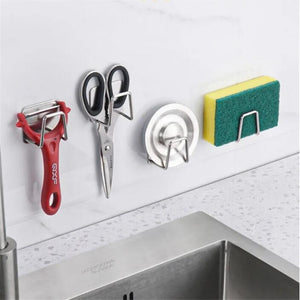 https://www.kitchenswags.com/cdn/shop/products/Kitchen-Stainless-Steel-Sink-Sponges-Holder-Self-Adhesive-Drain-Drying-Rack-Kitchen-Wall-Hooks-Accessories-Storage_f72a1c21-3146-43a9-954c-db9670c2b6fb_300x.jpg?v=1667825865